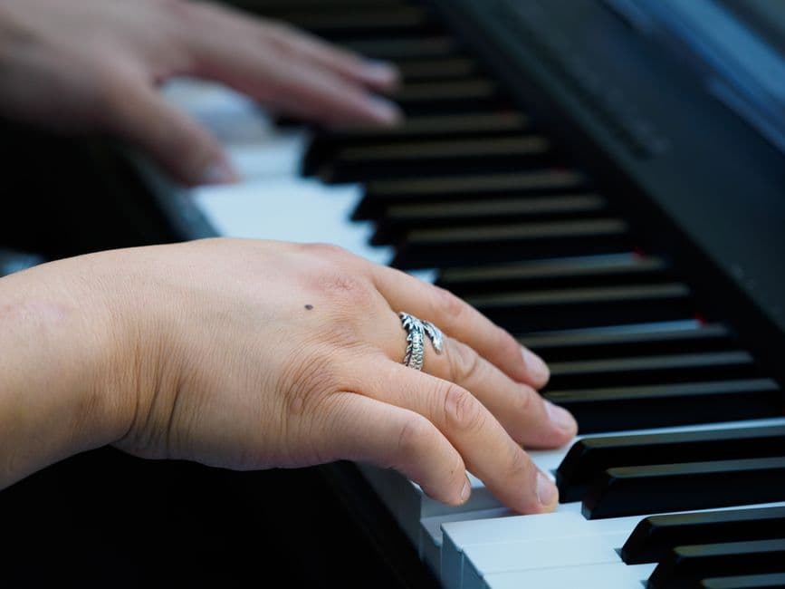 Piano keys in close up, piano lessons serving Marietta, GA