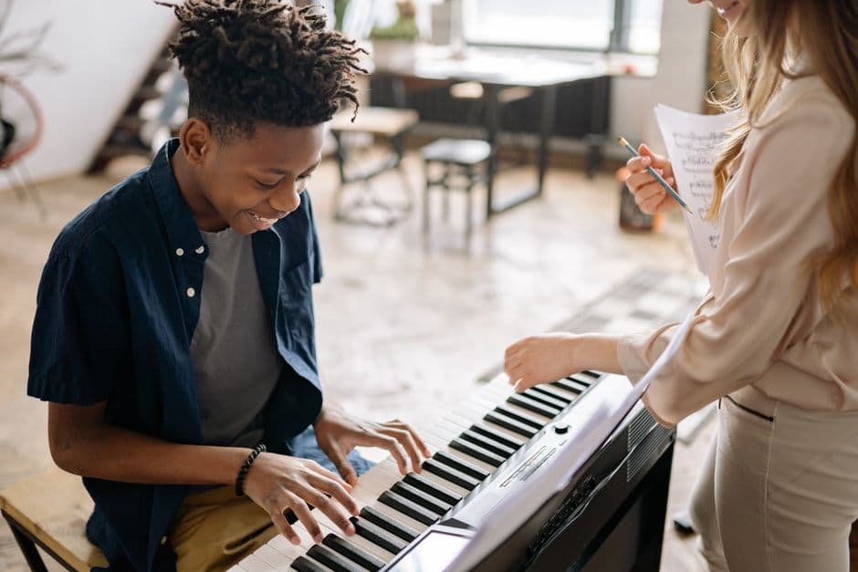 Piano student in a lesson near Roswell, GA