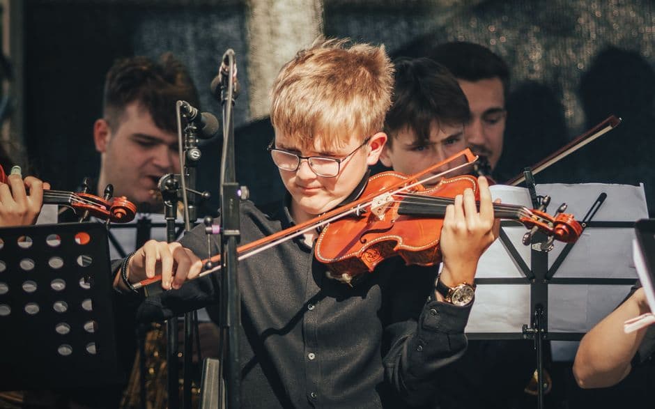 Youth string orchestra players near Sugar Hill, GA
