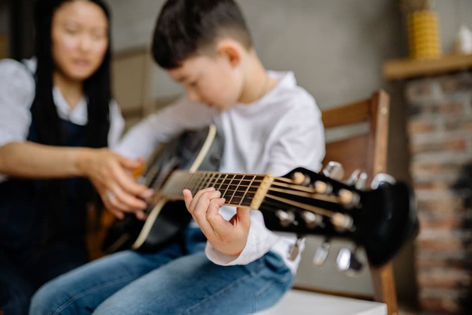 Guitar student in a lesson near Suwanee, GA