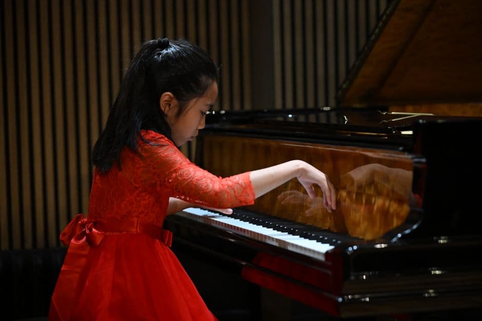 Piano student in a lesson near Buckhead, GA