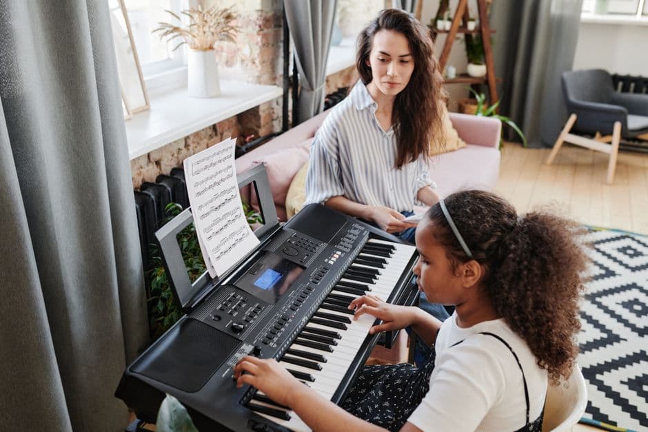 Piano student in a lesson near Kennesaw, GA