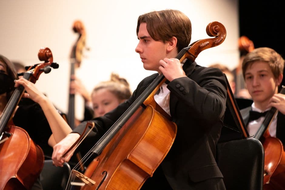 Youth string orchestra players near Cumming, GA