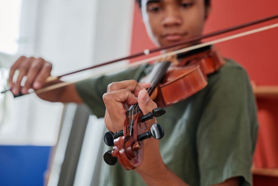 Youth string orchestra players near Peachtree Corners, GA