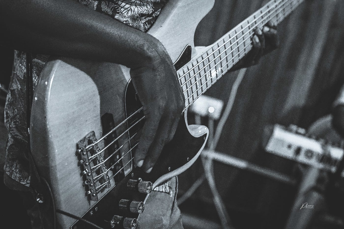 Bass guitar student working through a groove